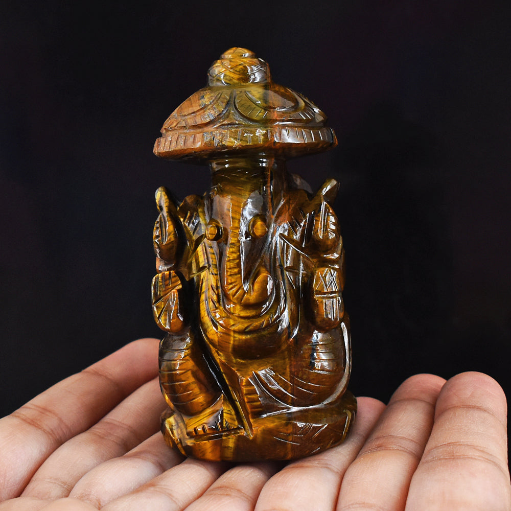 Natural 1186.00 Cts Genuine Golden Tiger Eye Hand Carved Lord Ganesha With Throne Gemstone Carving