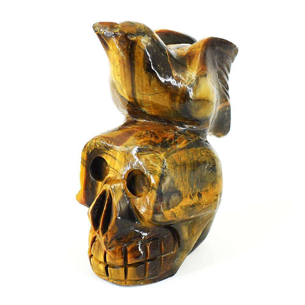 gemsmore:Artisian Tiger Eye Hand Carved Skull With Bird