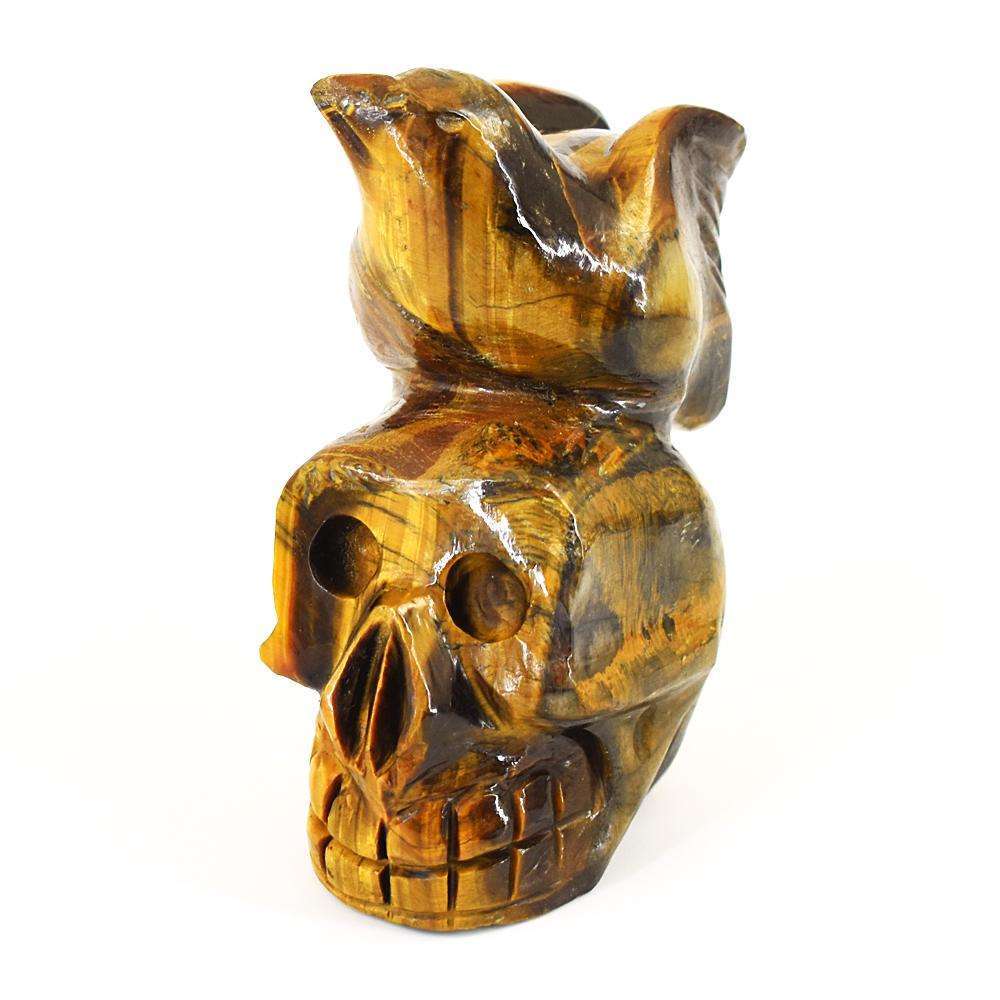 gemsmore:Artisian Tiger Eye Hand Carved Skull With Bird