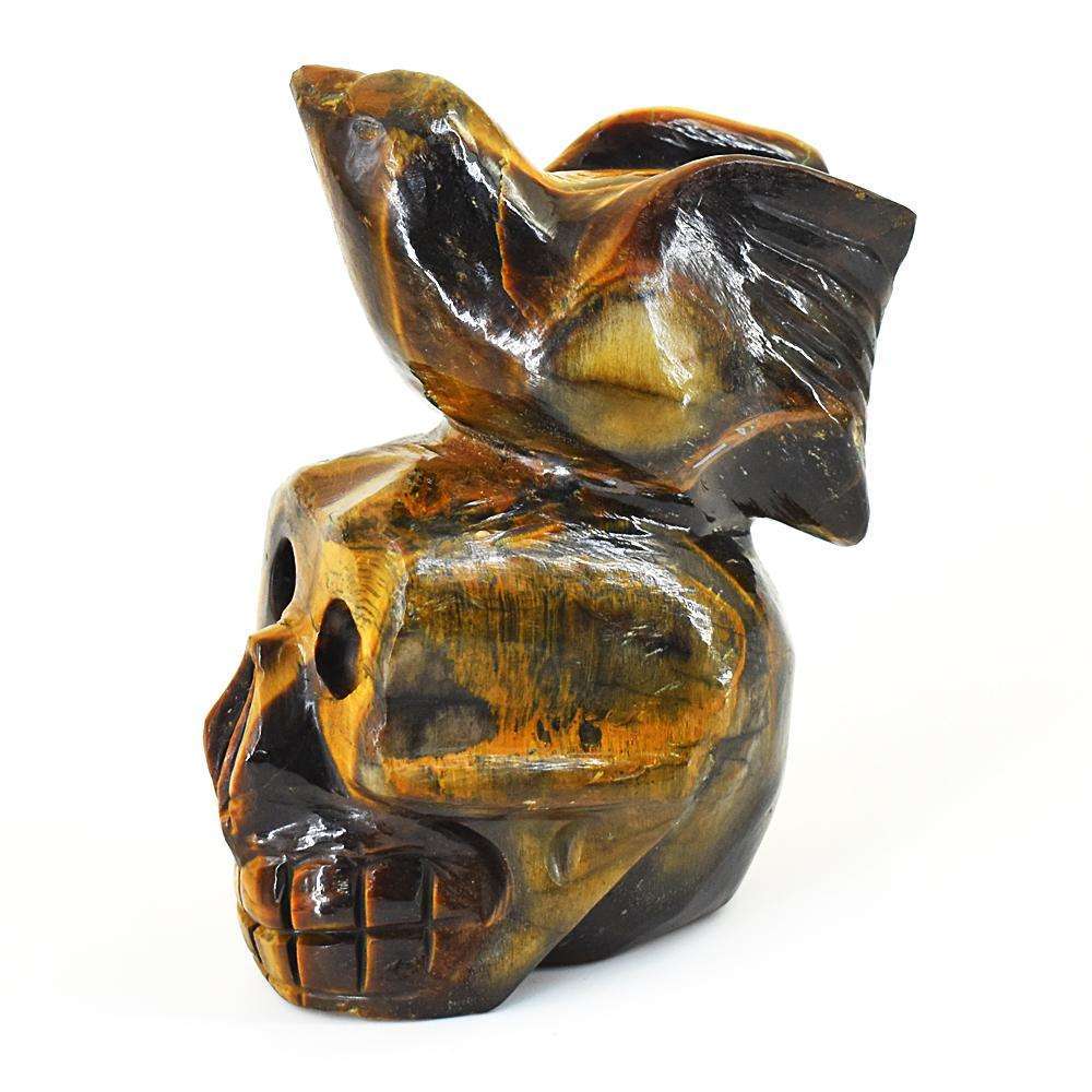 gemsmore:Artisian Tiger Eye Hand Carved Skull With Bird