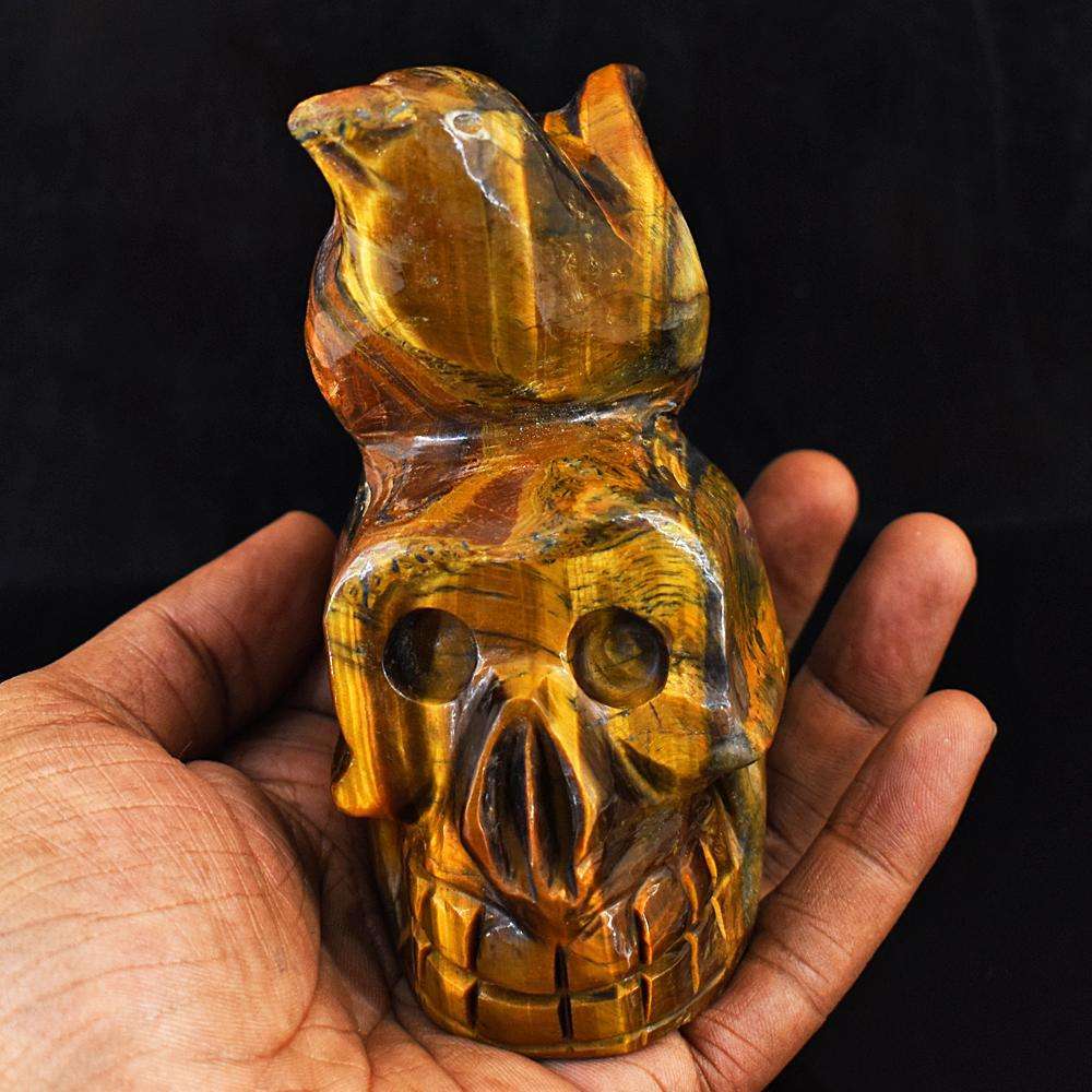 gemsmore:Artisian Tiger Eye Hand Carved Skull With Bird