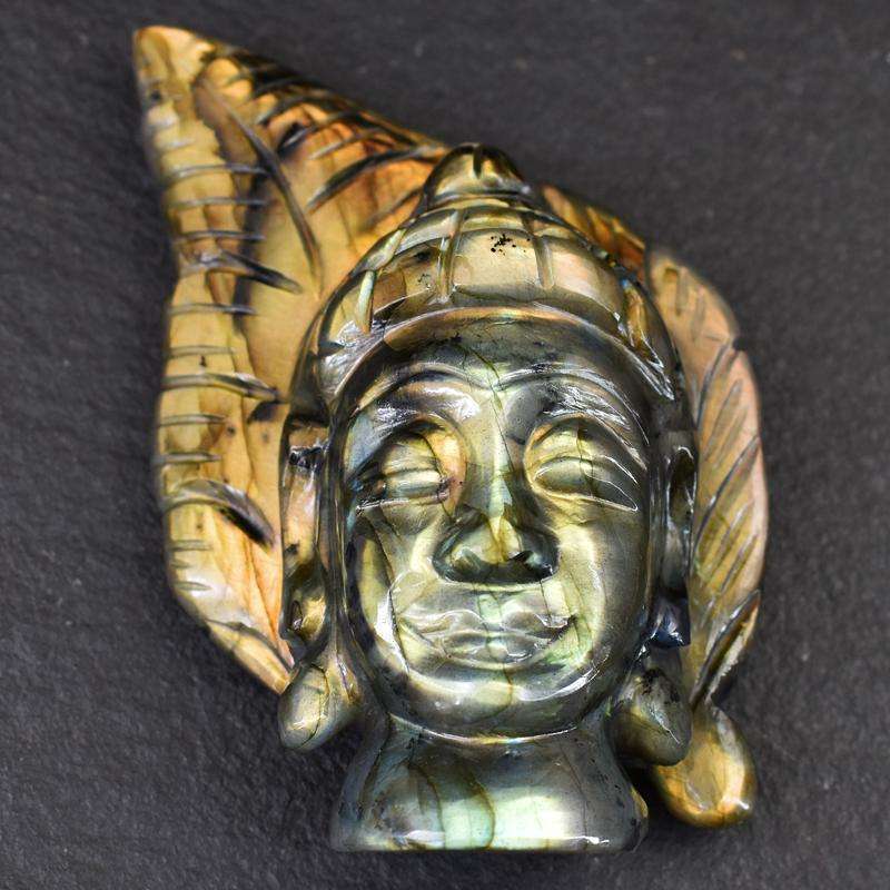 gemsmore:Golden Flash Labradorite Carved Lord Buddha Head With Leaf