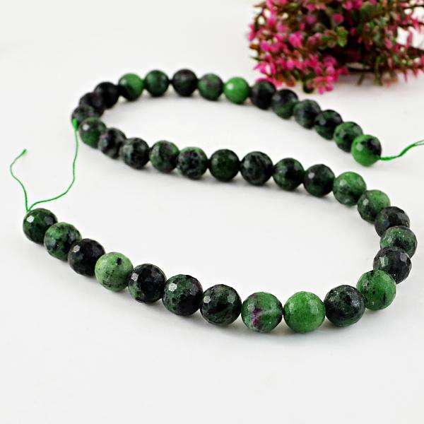 gemsmore:Natural Amazing Round Shape Faceted Ruby Zoisite Drilled Beads Strand