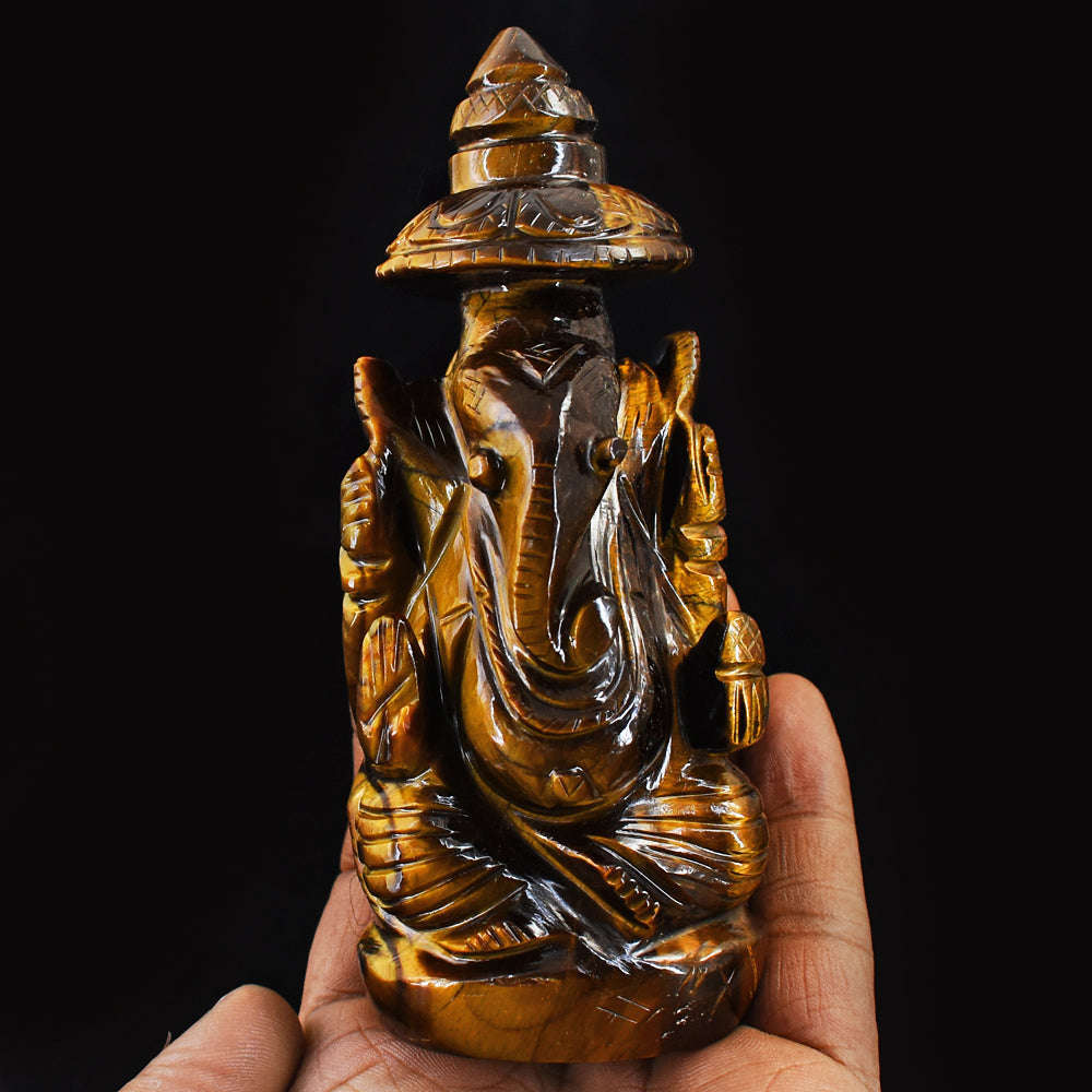 gemsmore:Natural Hand Carved Golden Tiger Eye Ganesha With Throne